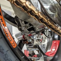 Evol Technology Ducati V4R / V4 / V4S / V4RS Speed Sensor Relocation Brake Carrier For Stock & Corse Swingarm